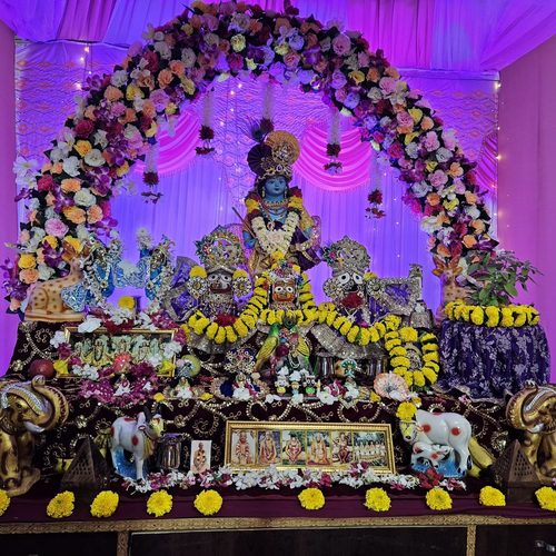 The altar lit for evening arati